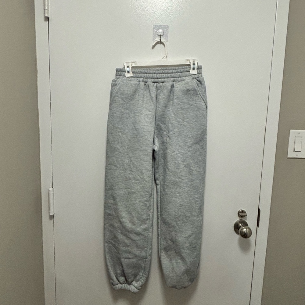 Grey jogger sweatpants.